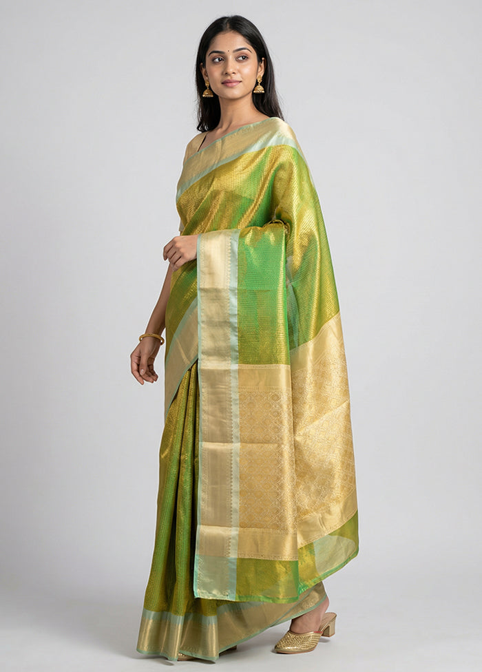 Green Tissue Silk Saree With Blouse Piece