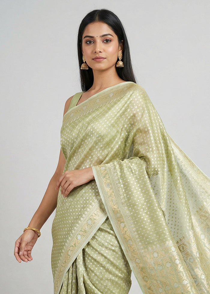 Green Tissue Silk Saree With Blouse Piece