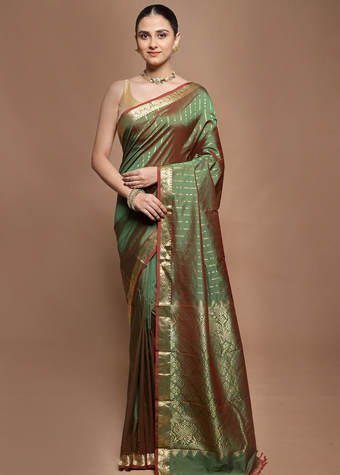 Green Kanjivaram Silk Saree With Blouse Piece