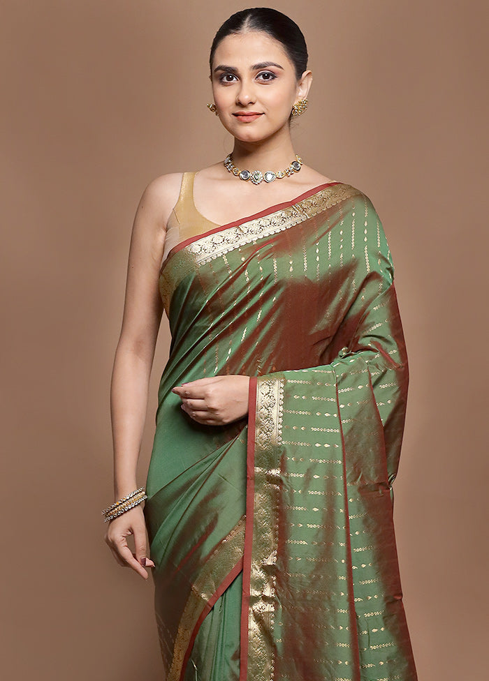 Green Kanjivaram Silk Saree With Blouse Piece