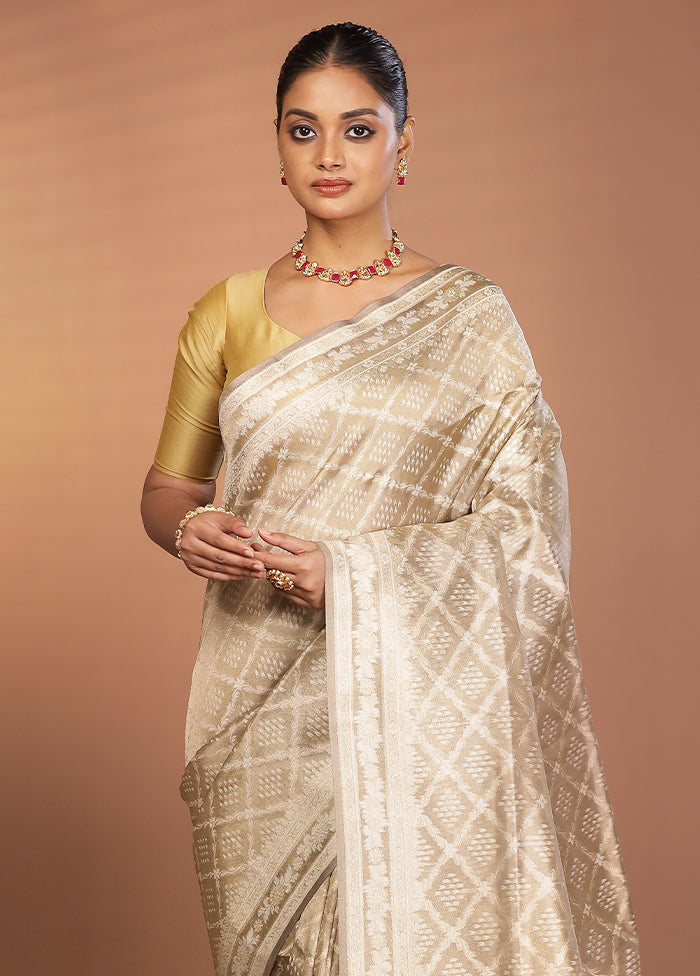 Cream Tissue Silk Saree With Blouse Piece