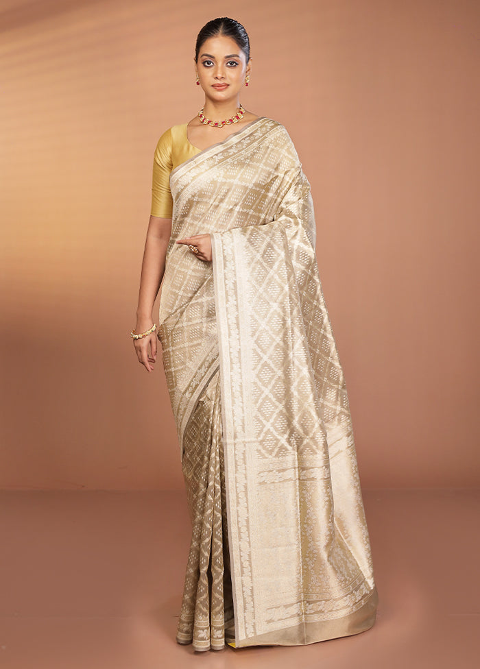 Cream Tissue Silk Saree With Blouse Piece