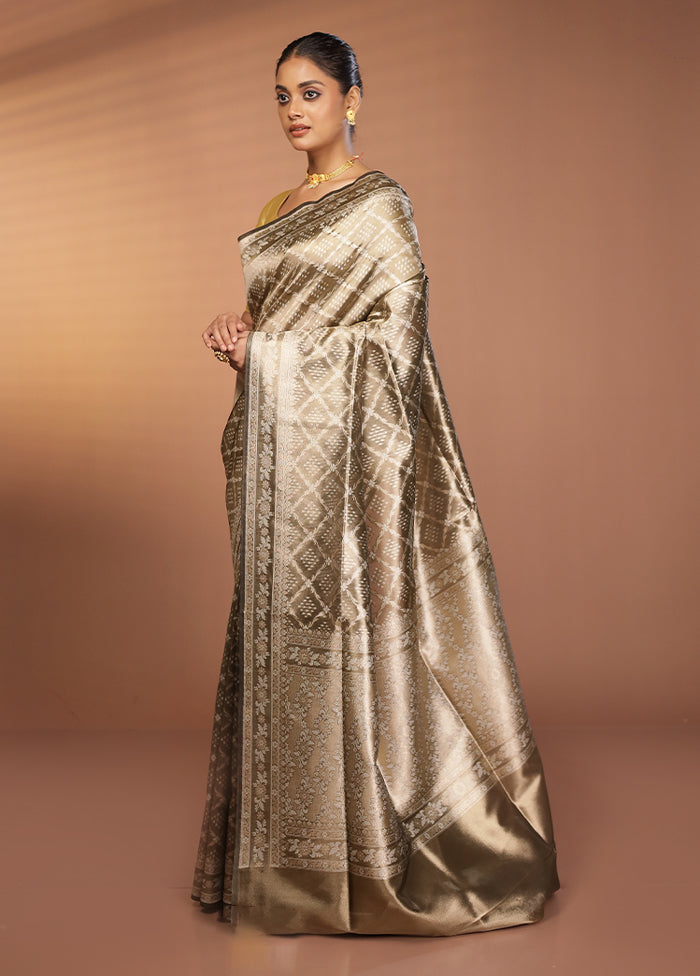 Cream Tissue Silk Saree With Blouse Piece