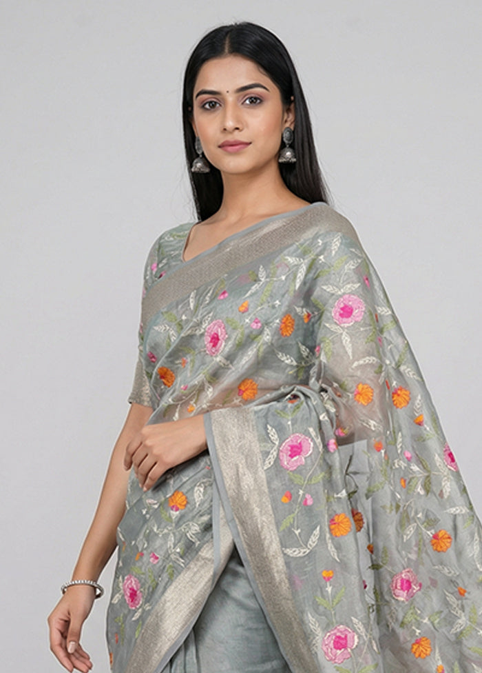 Green Tissue Silk Saree With Blouse Piece