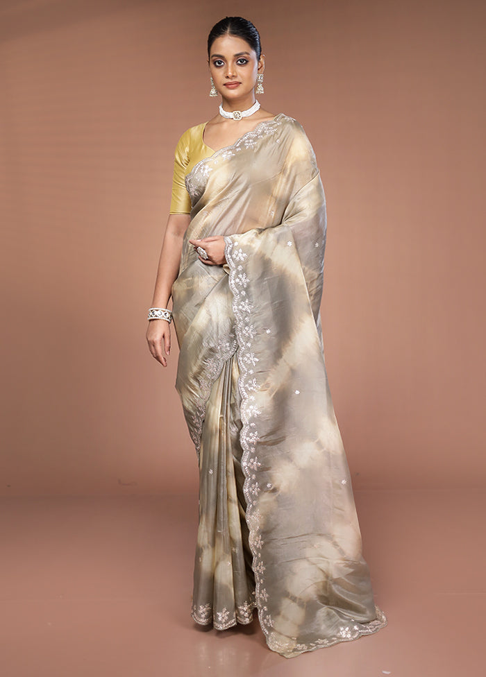 Cream Tissue Silk Saree With Blouse Piece