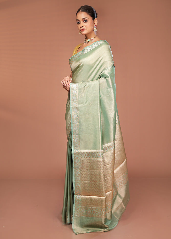Green Tissue Silk Saree With Blouse Piece