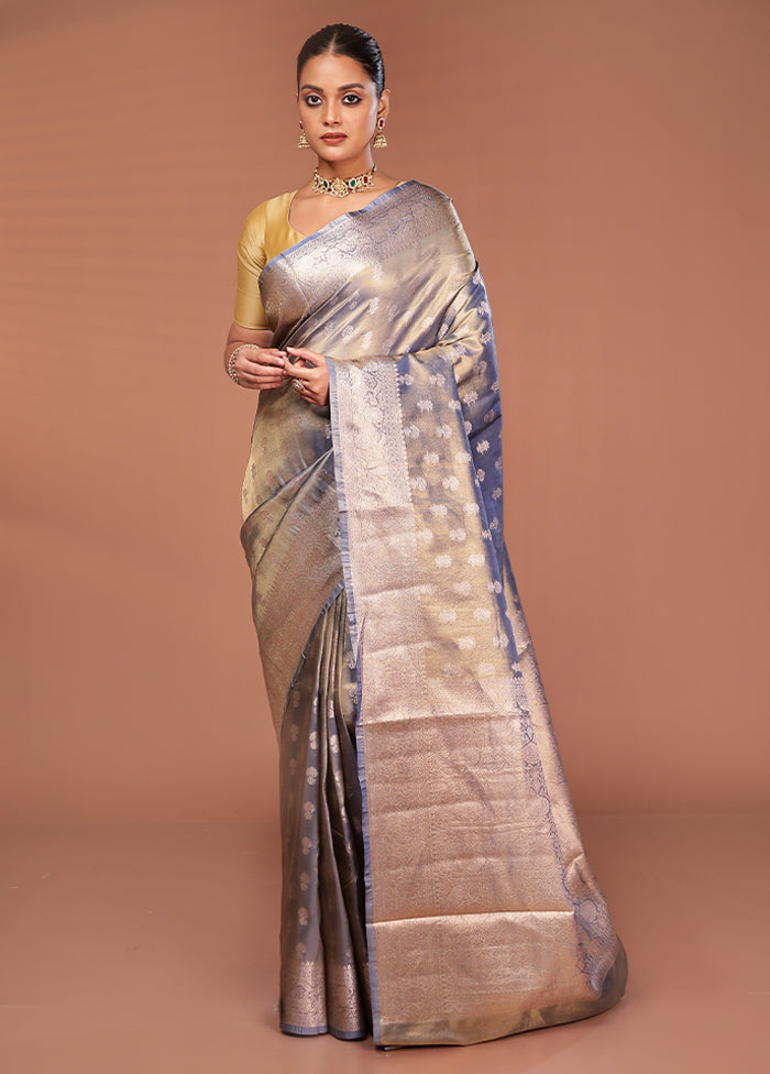 Green Tissue Silk Saree With Blouse Piece