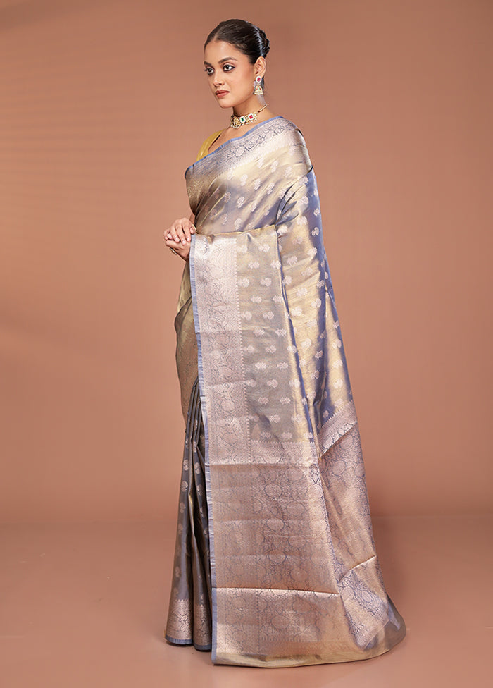 Green Tissue Silk Saree With Blouse Piece