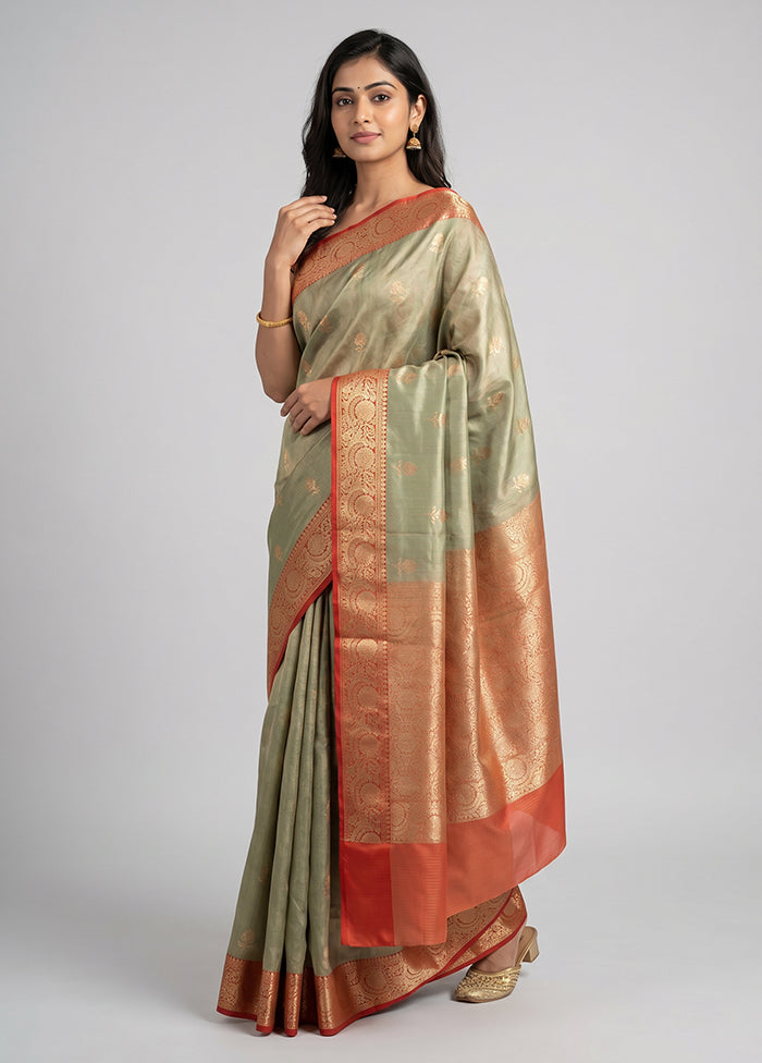 Green Tissue Silk Saree With Blouse Piece
