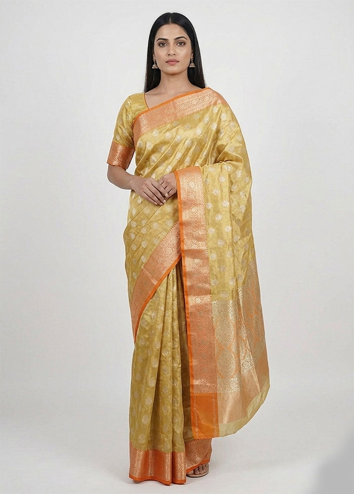 Green Tissue Silk Saree With Blouse Piece