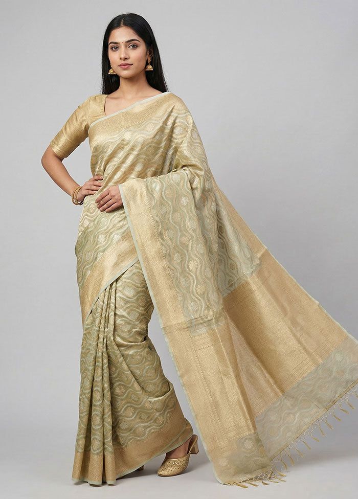 Green Tissue Silk Saree With Blouse Piece