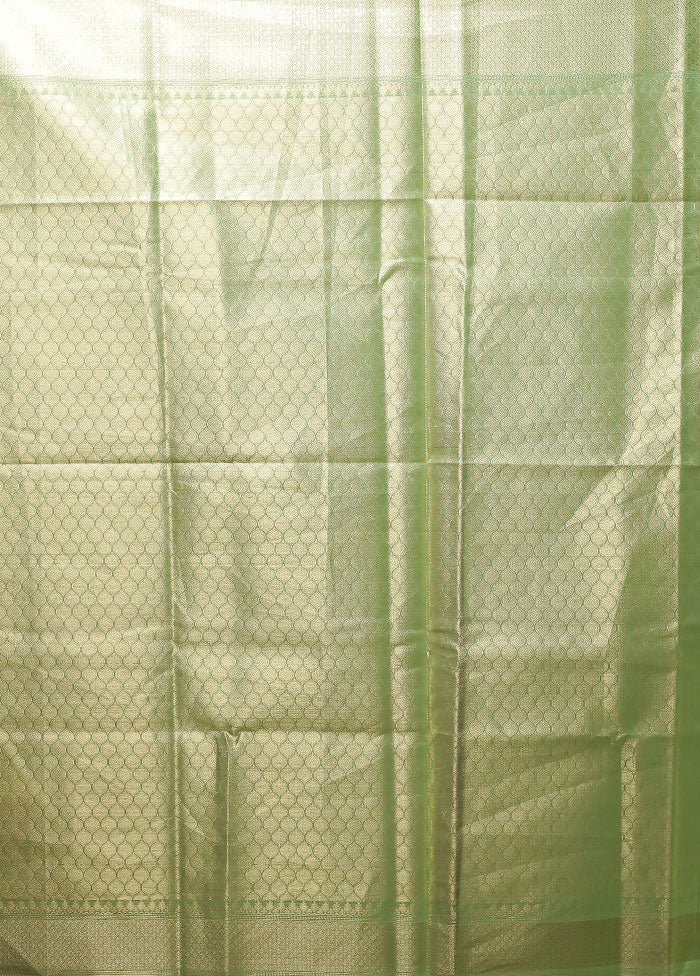 Green Tissue Silk Saree With Blouse Piece