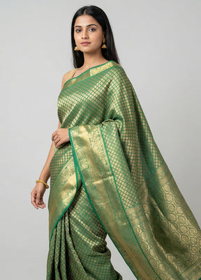 Green Kanjivaram Silk Saree With Blouse Piece