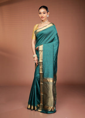 Green Kanjivaram Silk Saree With Blouse Piece