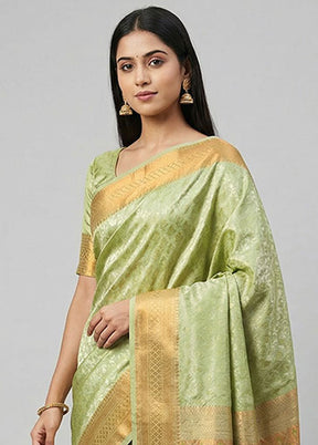 Green Kanjivaram Silk Saree With Blouse Piece
