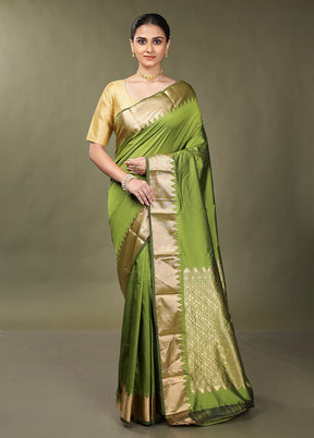 Green Kanjivaram Silk Saree With Blouse Piece