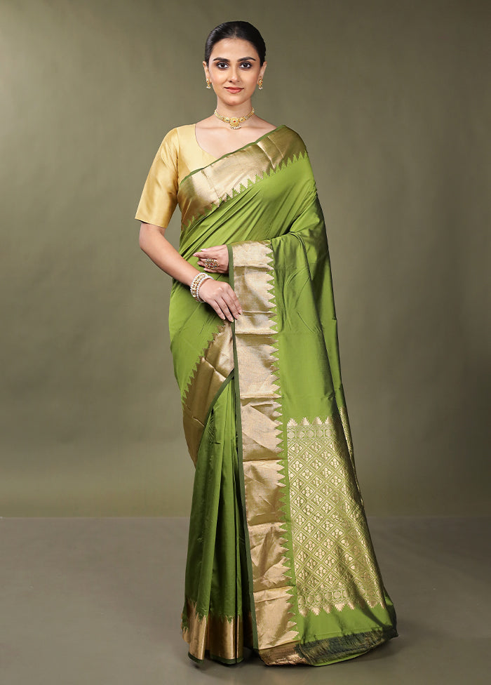 Green Kanjivaram Silk Saree With Blouse Piece