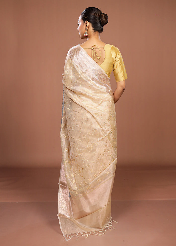 Cream Tissue Silk Saree With Blouse Piece
