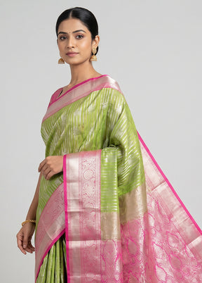 Green Kanjivaram Silk Saree With Blouse Piece