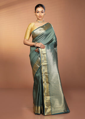 Green Kanjivaram Silk Saree With Blouse Piece