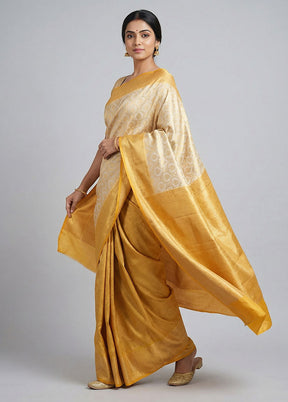 Cream Tissue Silk Saree With Blouse Piece
