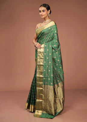 Green Kanjivaram Silk Saree With Blouse Piece