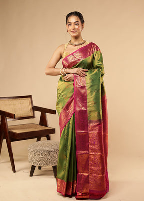 Green Kanjivaram Silk Saree With Blouse Piece