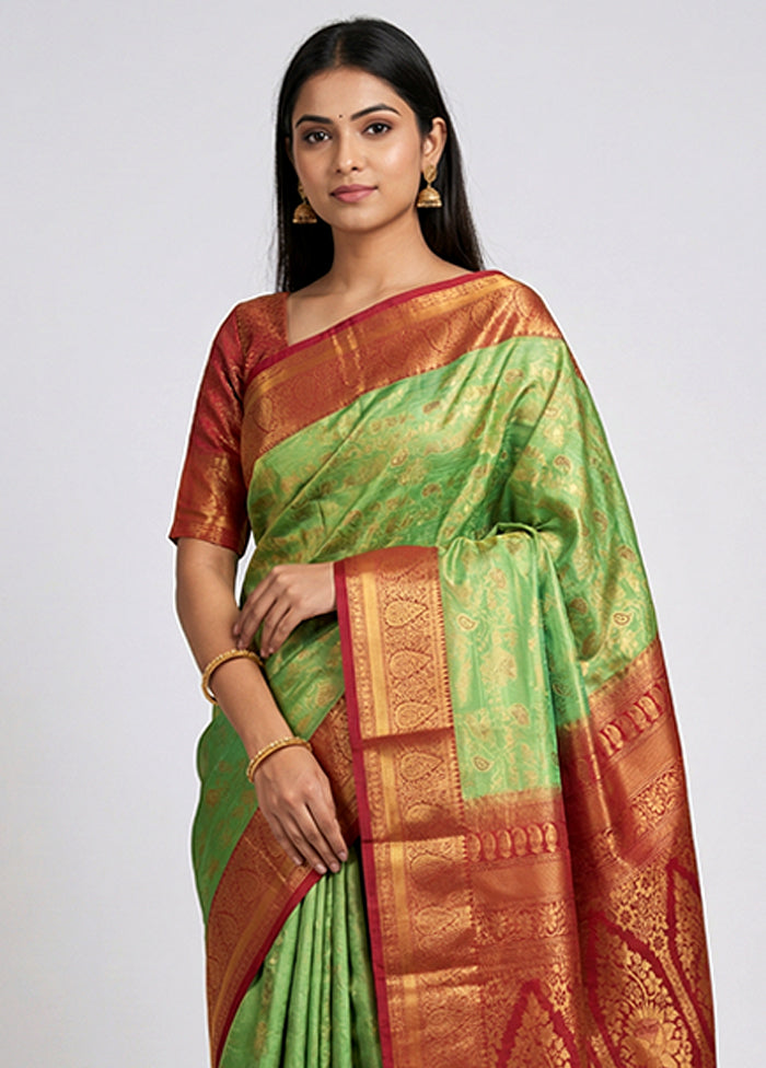 Green Kanjivaram Silk Saree With Blouse Piece