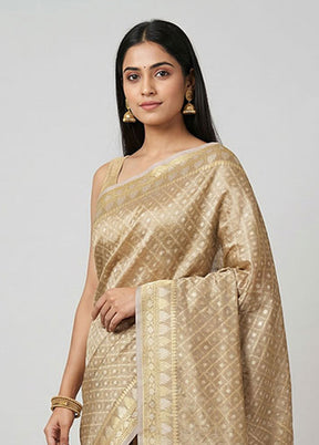 Cream Tissue Silk Saree With Blouse Piece