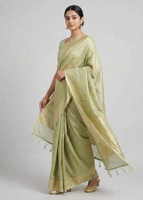 Green Tissue Silk Saree With Blouse Piece
