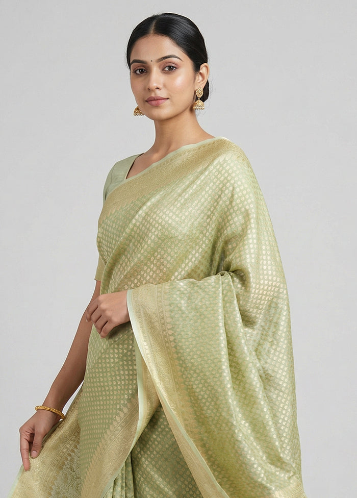 Green Tissue Silk Saree With Blouse Piece
