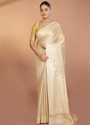Cream Tissue Silk Saree With Blouse Piece