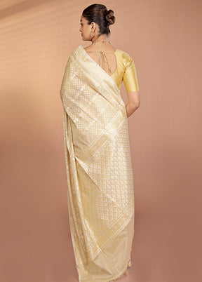 Cream Tissue Silk Saree With Blouse Piece