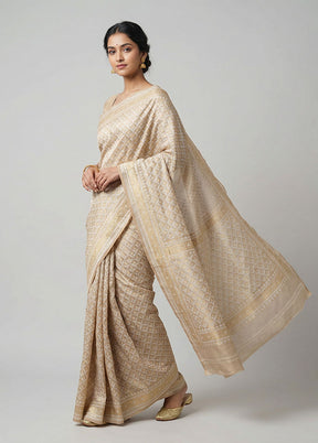 Cream Tissue Silk Saree With Blouse Piece