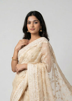Cream Net Saree With Blouse Piece