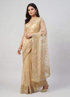 Cream Net Saree With Blouse Piece