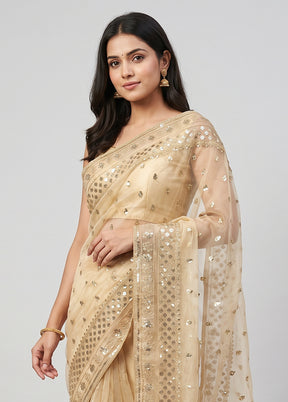 Cream Net Saree With Blouse Piece