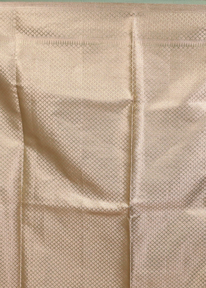 Cream Tissue Silk Saree With Blouse Piece