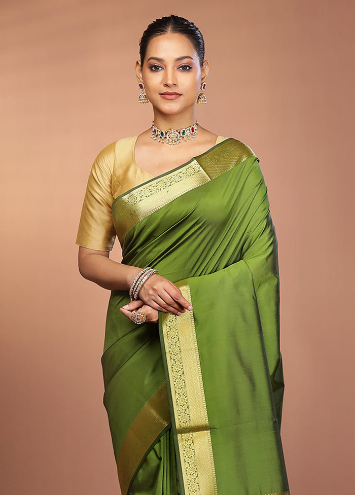 Green Kanjivaram Silk Saree With Blouse Piece