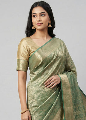 Green Tissue Silk Saree With Blouse Piece