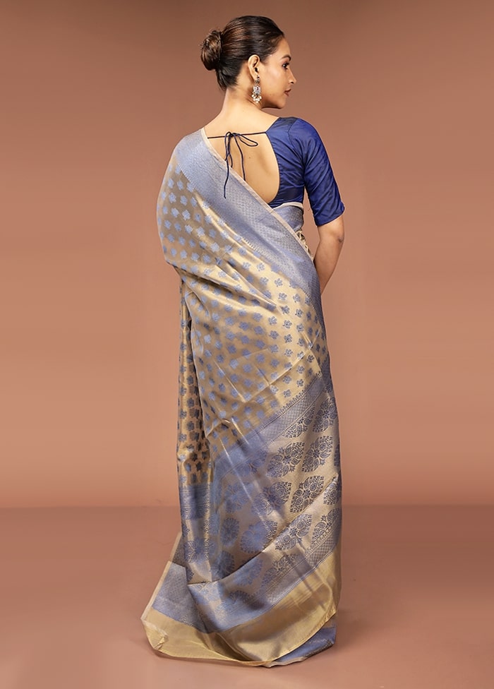 Cream Tissue Silk Saree With Blouse Piece