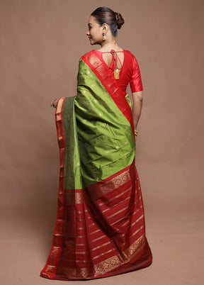 Green Kanjivaram Silk Saree With Blouse Piece