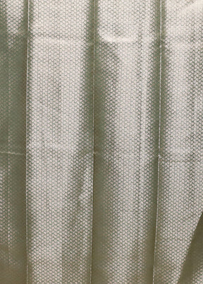 Green Tissue Silk Saree With Blouse Piece