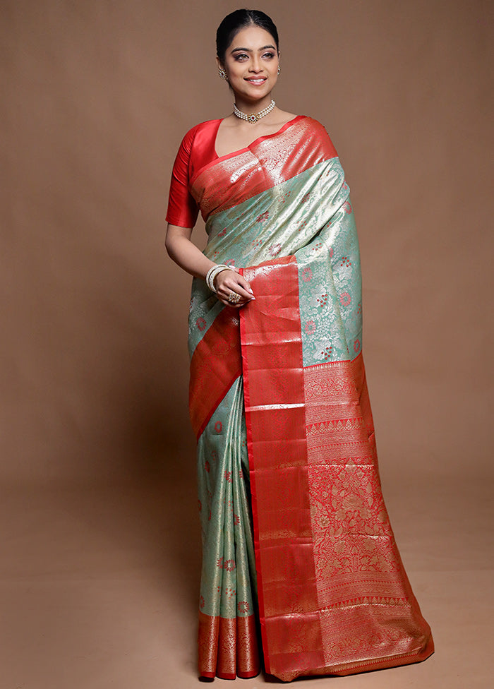 Green Kanjivaram Silk Saree With Blouse Piece