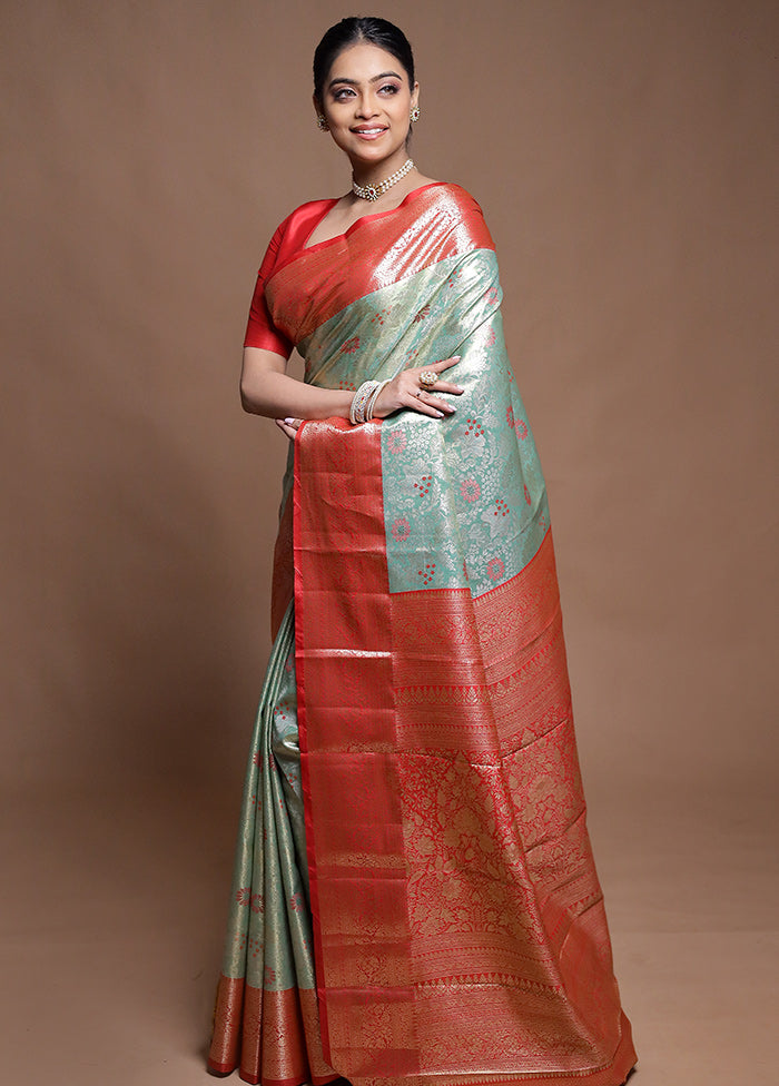 Green Kanjivaram Silk Saree With Blouse Piece