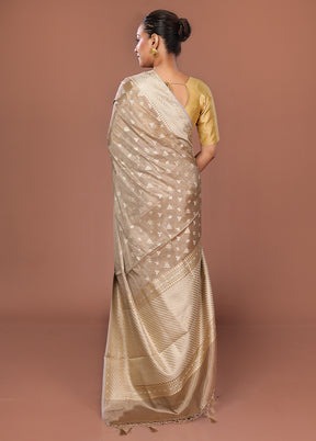 Cream Tissue Silk Saree With Blouse Piece