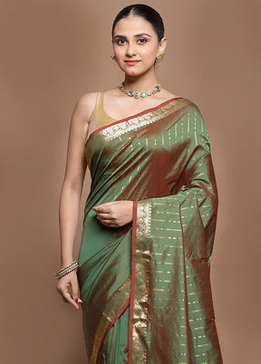 Green Kanjivaram Silk Saree With Blouse Piece