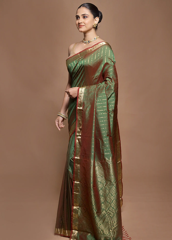 Green Kanjivaram Silk Saree With Blouse Piece