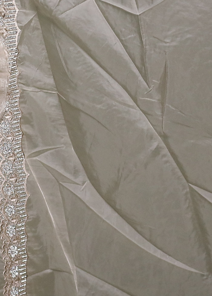 Cream Crushed Tissue Silk Saree With Blouse Piece