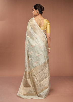 Green Tissue Silk Saree With Blouse Piece